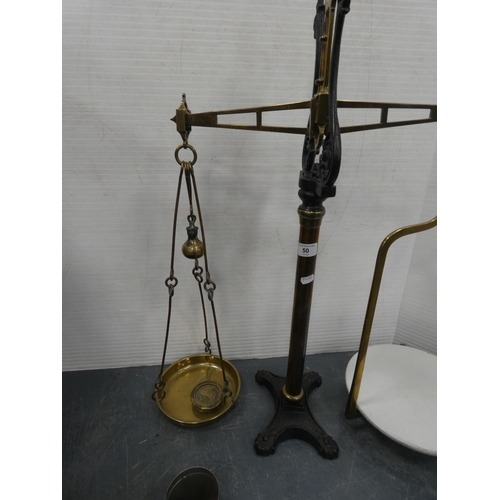 50 - Set of Edwardian brass and cast balance scales, with weights.