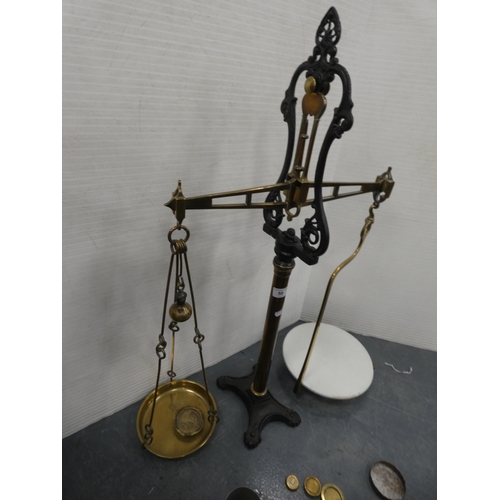 50 - Set of Edwardian brass and cast balance scales, with weights.