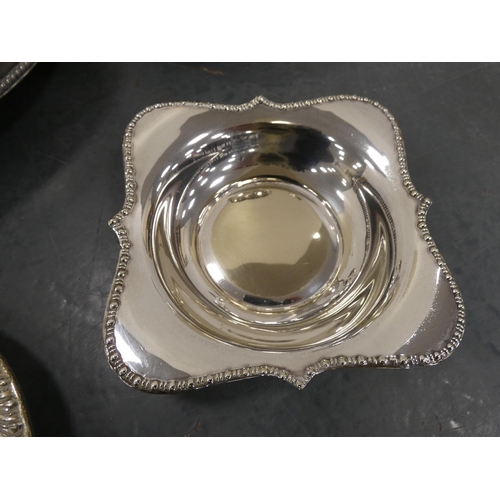 55 - Small group of plated wares to include trays, teapot and a bowl.