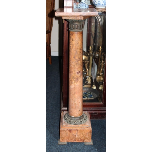Red marble square topped column pedestal raised on square stepped base ...