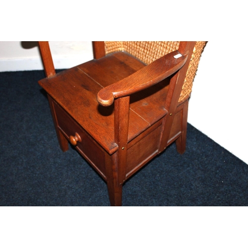 371 - Oak Orkney chair with hooded back or 'Heided stool' with single base drawer.