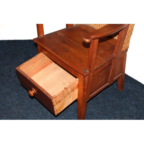 371 - Oak Orkney chair with hooded back or 'Heided stool' with single base drawer.