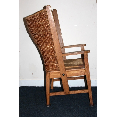 372 - Antique oak Orkney chair raised on square tapering supports.