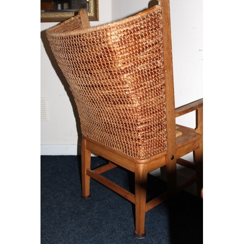 372 - Antique oak Orkney chair raised on square tapering supports.