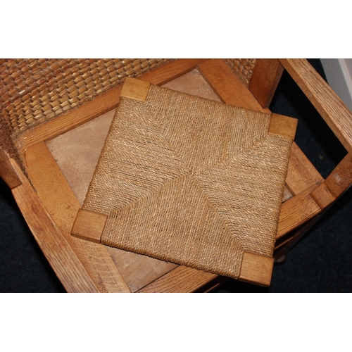 372 - Antique oak Orkney chair raised on square tapering supports.