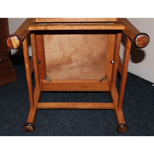 372 - Antique oak Orkney chair raised on square tapering supports.
