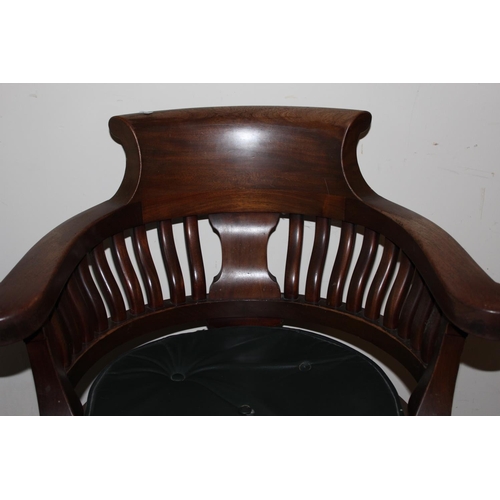 376 - Victorian mahogany spindle back swivel desk armchair with green leather seat pad raised on cabriole ... 