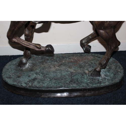 377 - In the manner of Pierre Jules Mene - large bronze effect spelter group depicting horse and jockey, 1... 