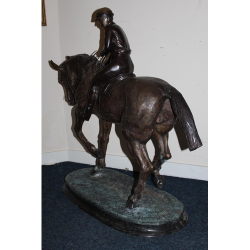 377 - In the manner of Pierre Jules Mene - large bronze effect spelter group depicting horse and jockey, 1... 