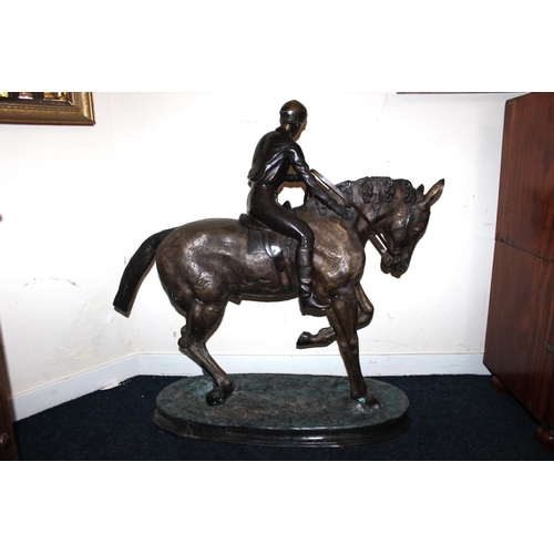 377 - In the manner of Pierre Jules Mene - large bronze effect spelter group depicting horse and jockey, 1... 