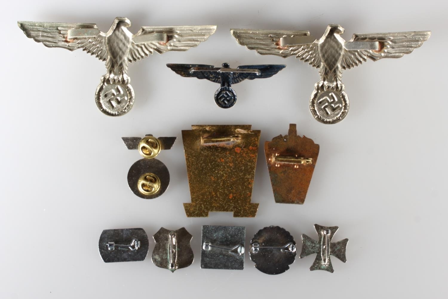 20th century Nazi German badges and insignia to include two parteiadler ...