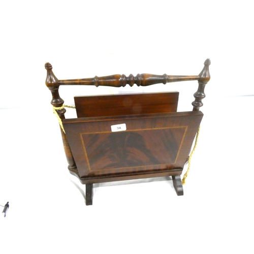 34 - Carved oak magazine rack and another (2)