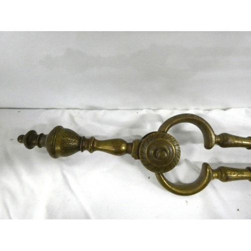 42 - Various antique fireside tools including brass coal nips etc.