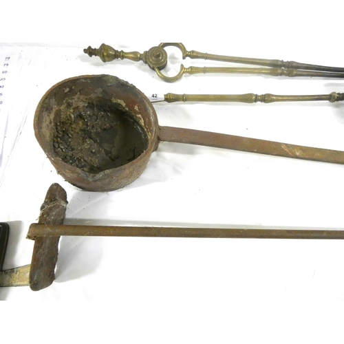 42 - Various antique fireside tools including brass coal nips etc.