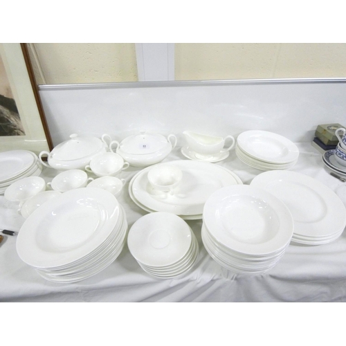 53 - Wedgwood and other white glazed dinnerware.