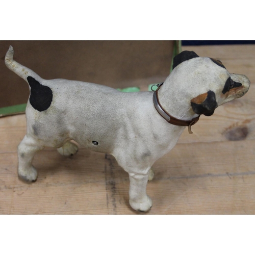 1106 - Antique clockwork automaton in the form of a Jack Russell dog, 18cm tall, held in cardboard box with... 