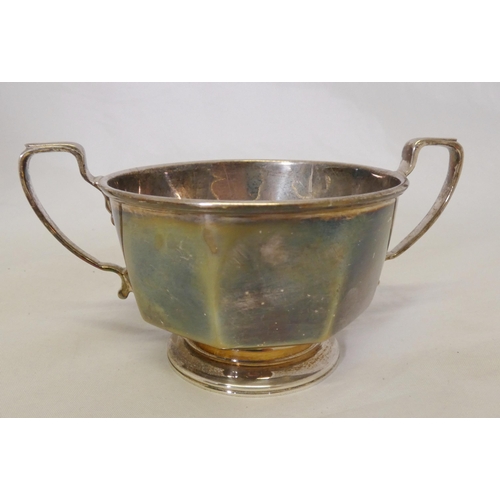 40A - Silver bachelor's three-piece tea service comprising a teapot, sugar and cream, by Davidson, Henders... 