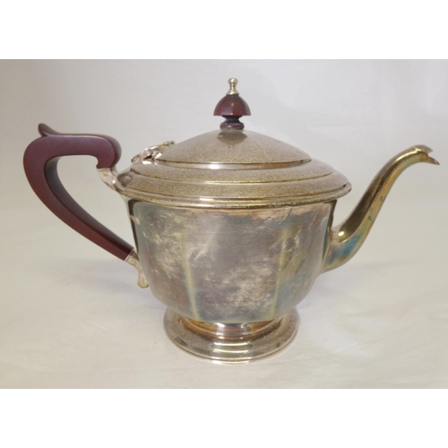 40A - Silver bachelor's three-piece tea service comprising a teapot, sugar and cream, by Davidson, Henders... 