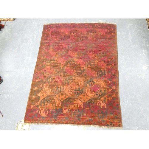 Antique Ersari wool red ground wool rug. 238cm x 174cm.