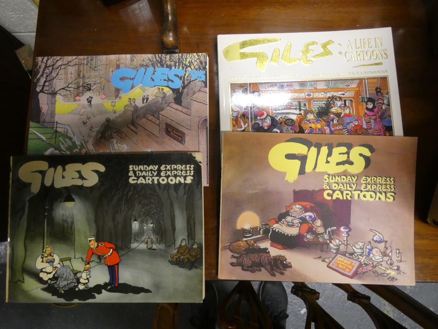 Large box of Giles annuals.