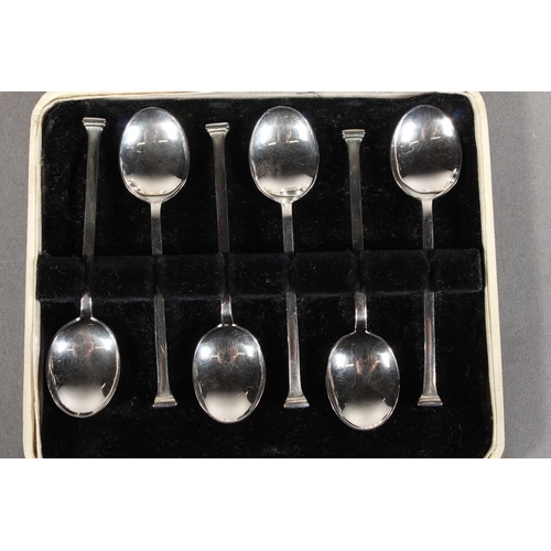 Four silver napkin rings, 47g, and cased set of EP spoons.