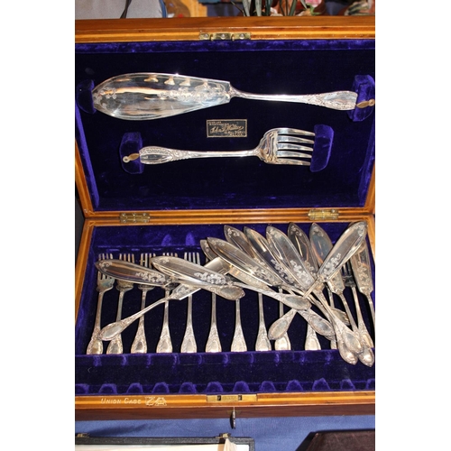 110 - Cased set of thistle style condiments, Christening set and a canteen of fish cutlery.