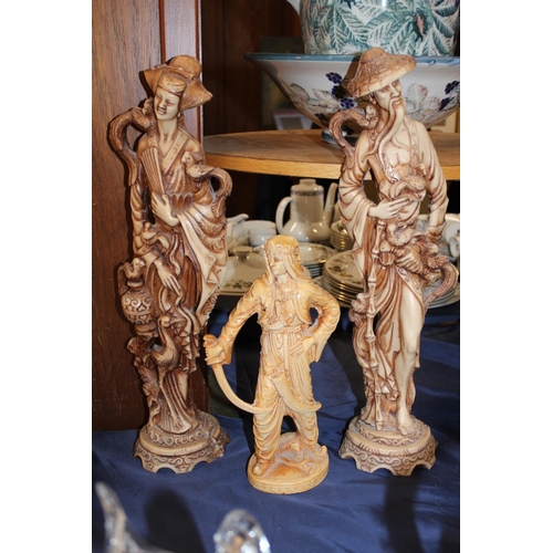 119 - Two Royal Crystal Rock figures and three resin figures.