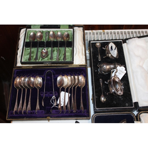 127 - Collection of silver plated flatware, cased teaspoons, condiment sets, souvenir spoons etc.