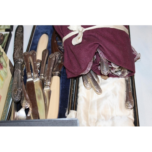 127 - Collection of silver plated flatware, cased teaspoons, condiment sets, souvenir spoons etc.