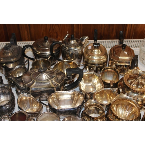 129 - Collection of silver plated tea services.