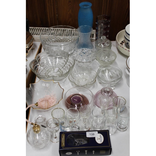 130 - Collection of glassware including vases and bowls, shot glasses etc.