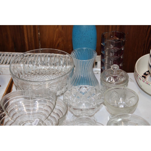130 - Collection of glassware including vases and bowls, shot glasses etc.