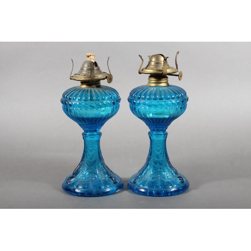 136 - Pair of turquoise blue glass paraffin lamp bases..
