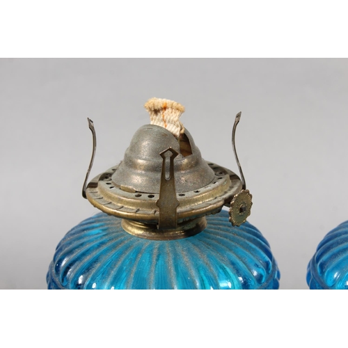 136 - Pair of turquoise blue glass paraffin lamp bases..