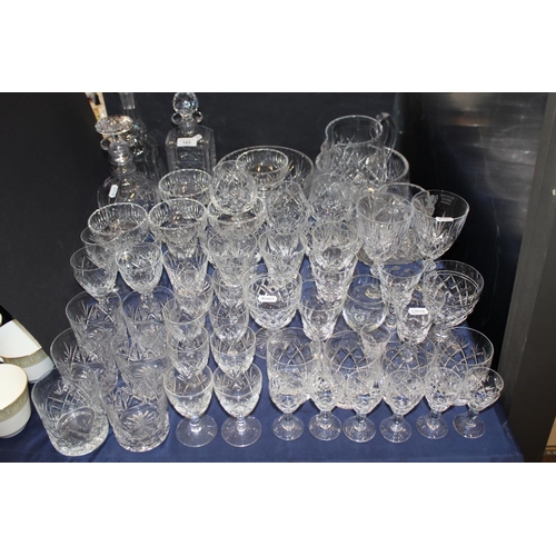 143 - Large collection of glassware including decanters, bowls, jugs, Edinburgh crystal glasses, various t... 