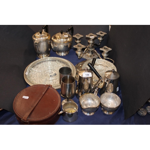 148 - Collection of silver plate including a candelabra, four piece tea service, etc.