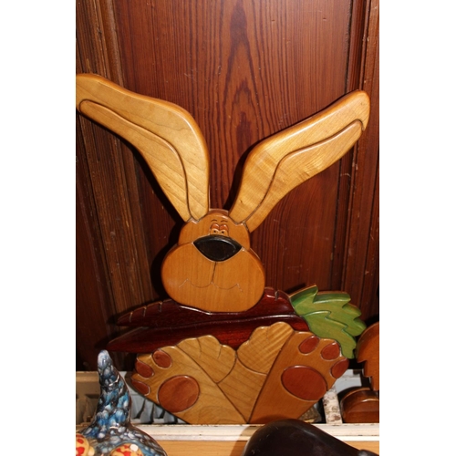 250 - Sidlaw Woodcarfts od Dundee, three carved wooden wall plaques to include Elephant, Scruffy dog and R... 