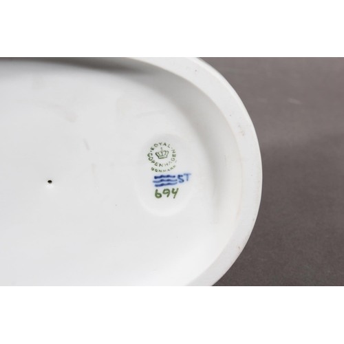 300 - Royal Copenhagen porcelain figure group of a lady with two goats, number 694, 23cm tall.