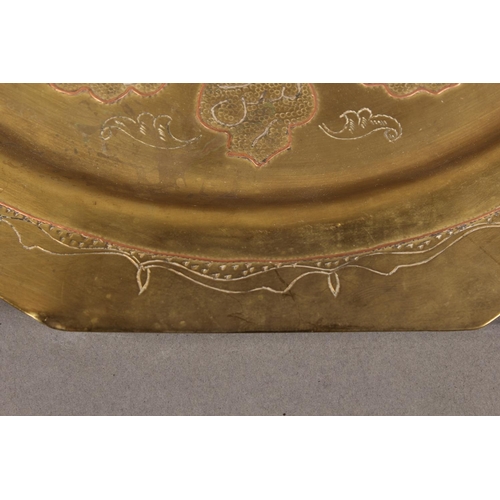 309 - Syrian Damascus style copper and silver overlaid brass dish, 30cm diameter.&nbsp;