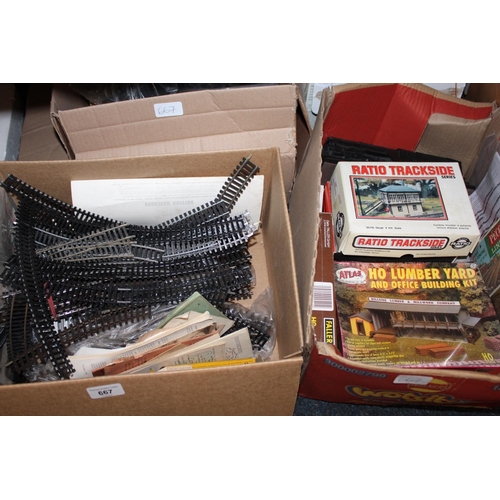 Seven boxes of model railway accessories to include building kits ...