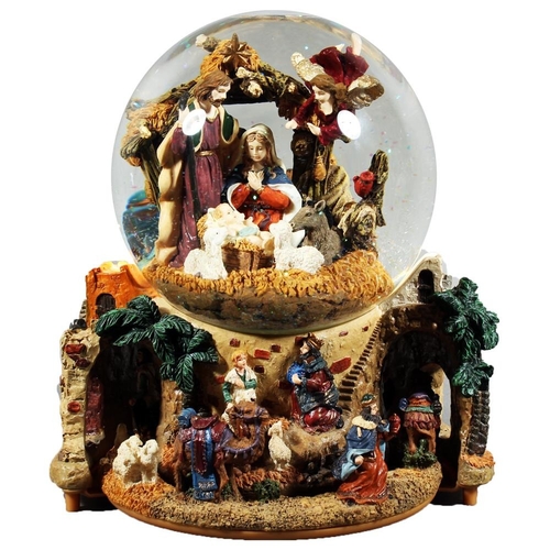 13 piece Nativity scene porcelain set and a musical snow globe, both boxed.