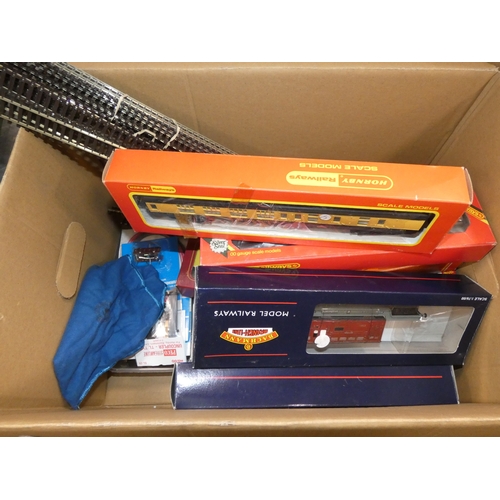 124 - Two cartons containing Hornby OO gauge models to include boxed coaches, also boxed Bachmann wagon, t... 