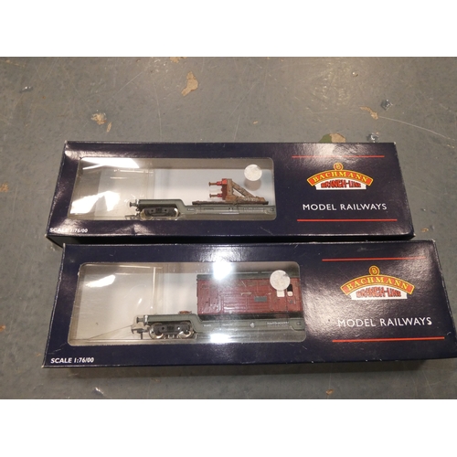 124 - Two cartons containing Hornby OO gauge models to include boxed coaches, also boxed Bachmann wagon, t... 