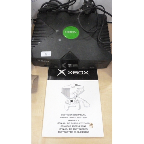 13 - Xbox console with two controllers, manual and accessories.
