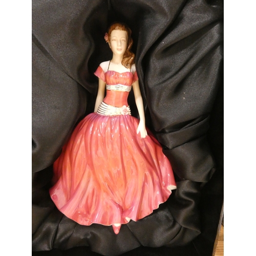 133 - Two Royal Doulton figures to include 'Christmas Day 2006', and 'English Rose', both boxed.  (2)