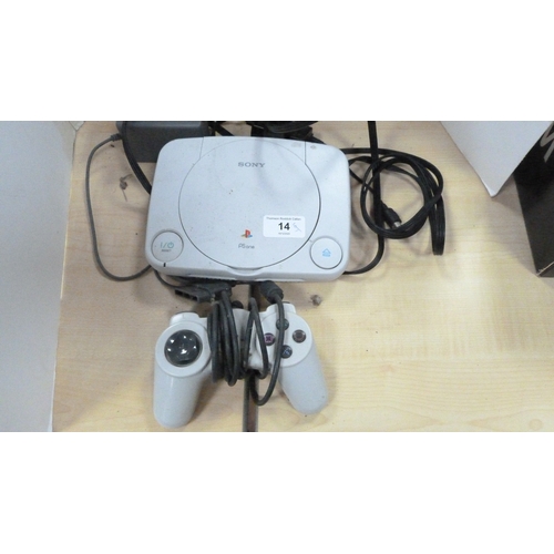 14 - Sony PS1 console with controller and a group of games to include Brian Lara Cricket, GTA 2 etc.