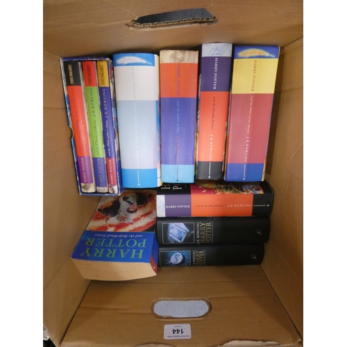 144 - Carton containing Harry Potter books to include first editions.