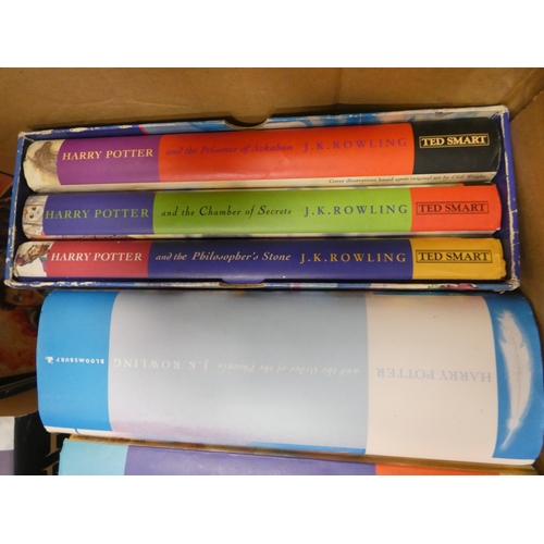144 - Carton containing Harry Potter books to include first editions.