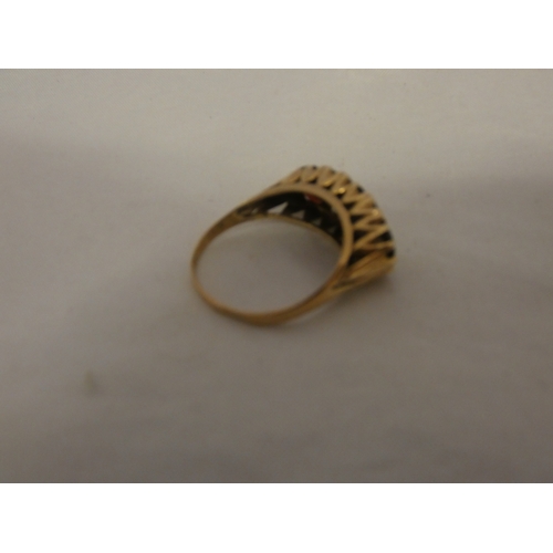 180 - 9ct gold garnet three-stone ring, '375', size S, 3.6g gross.