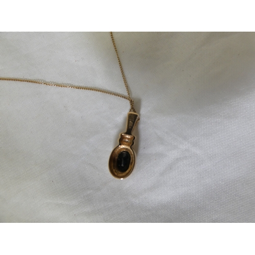 181 - 9ct gold gem-set pendant on a 9ct gold chain, '375', 2.3g gross.
